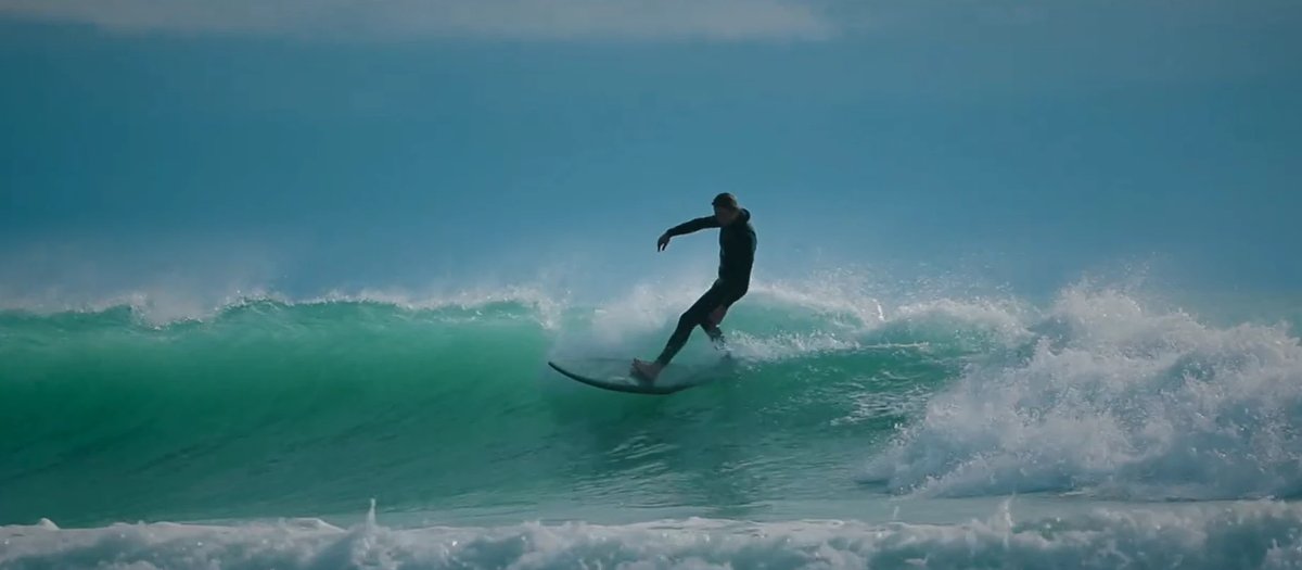 Trimming a clean green wall as the granite spit grooms the swell into something worth the wait, Schnappers Point surf spot, M